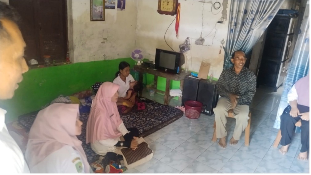 Kliping berita Pemkab Trenggalek — testimoni AM warga Desa Wonocoyo tentang program bantuan hukum